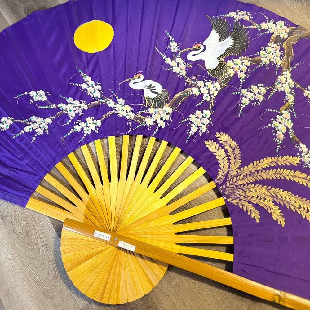 Japanese folding fan, known as a sensu or ogi 🪭